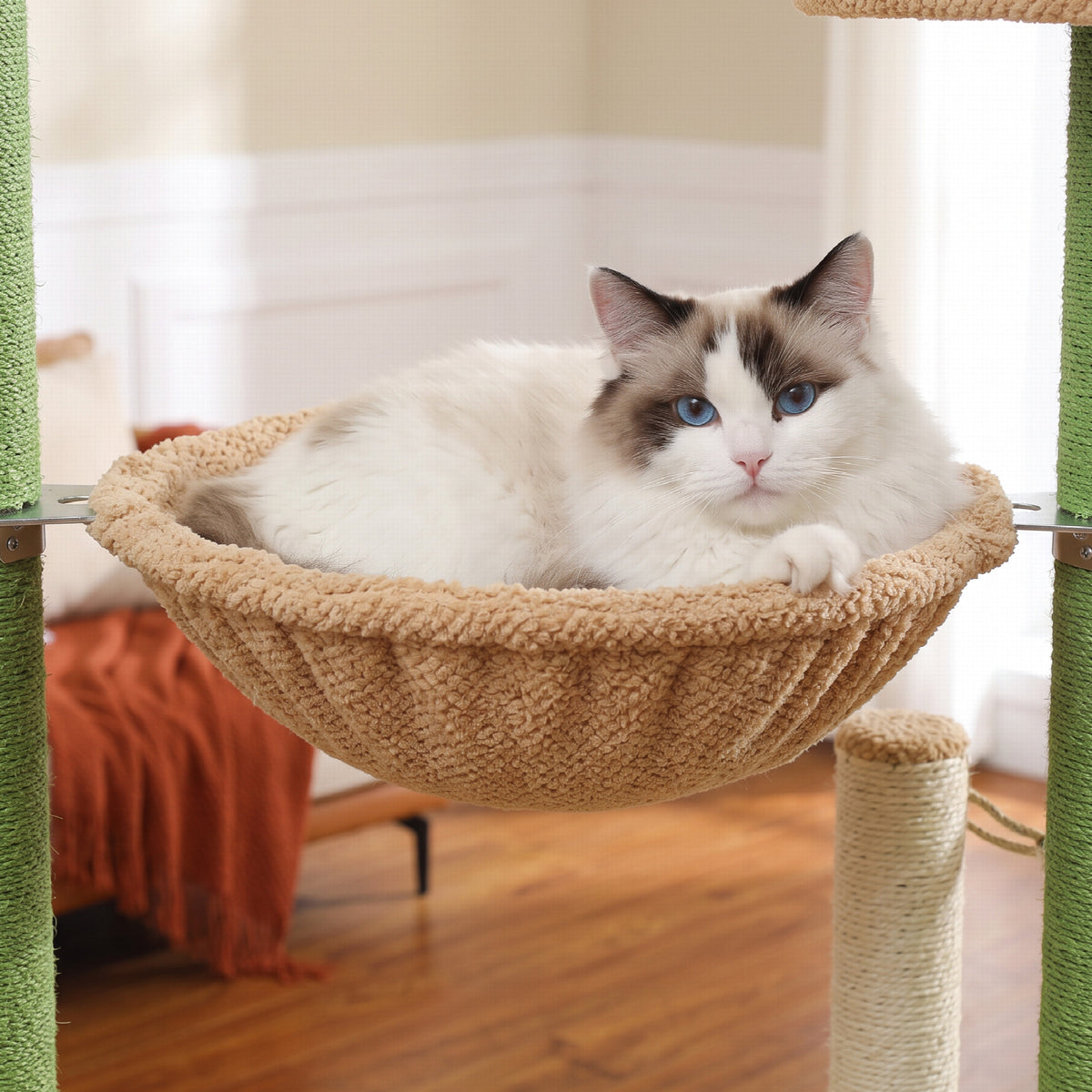 Green cactus-shaped floor-to-ceiling cat tree with 5+ levels, hammock, condo and sisal scratching posts — close-up