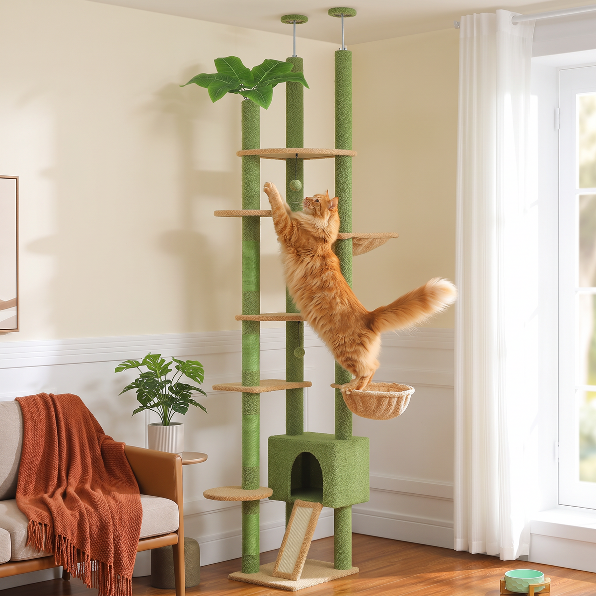 Green cactus-shaped floor-to-ceiling cat tree with 5+ levels, hammock, condo and sisal scratching posts — in use