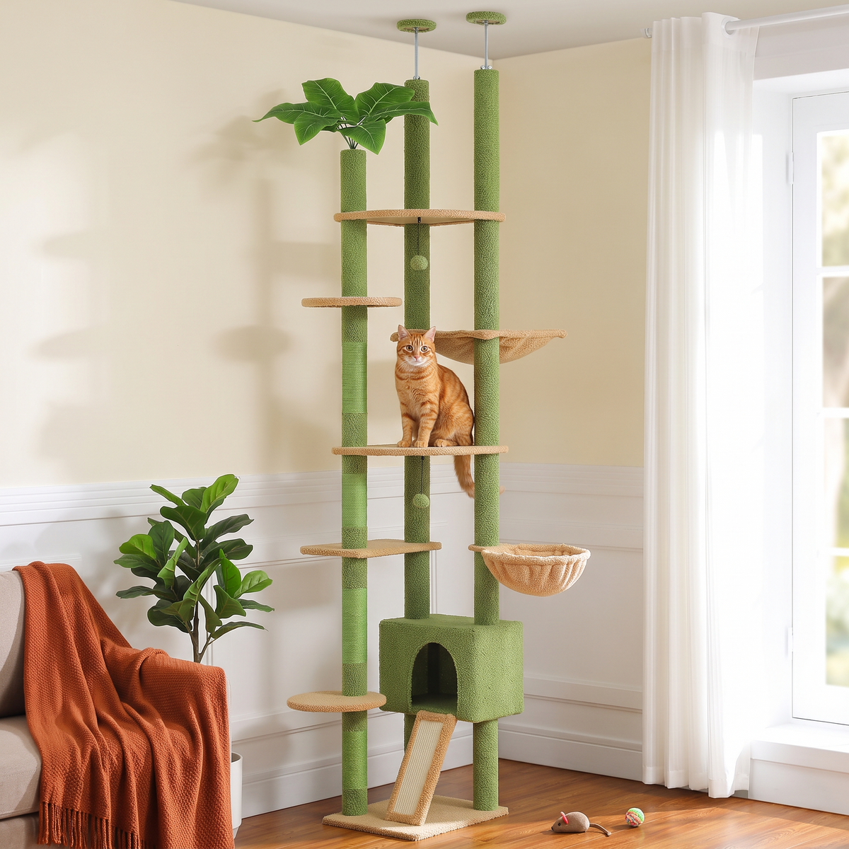 Green cactus-shaped floor-to-ceiling cat tree with 5+ levels, hammock, condo and sisal scratching posts — in a home